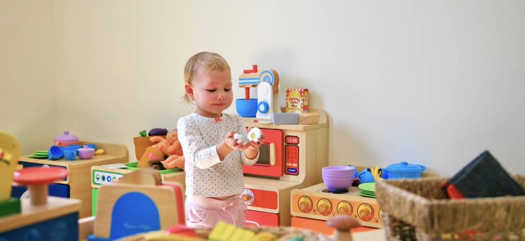 Child playing independently in an Australian early learning centre classroom
